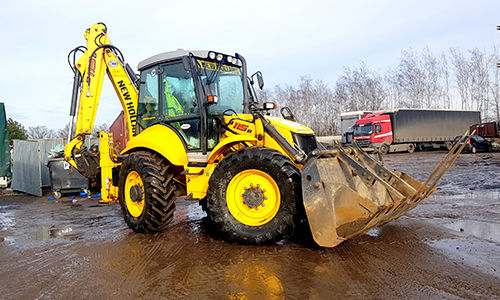 KOPARKO-ŁADOWARKA NEW HOLLAND